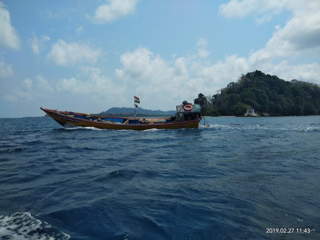 A small tourist boat on the sea off Swaraj Dweep (Havelock), Andaman Islands